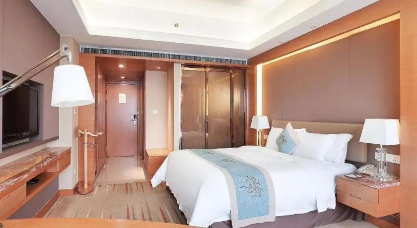 Bed in Howard Johnson by Wyndham Sunshine Plaza Ningbo