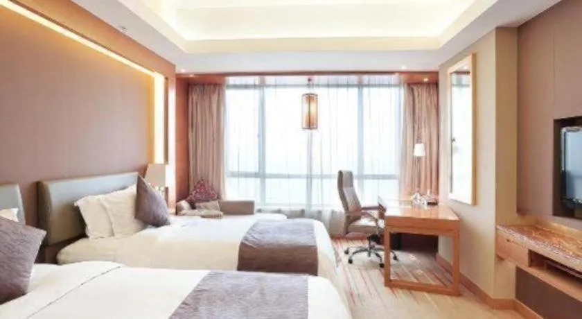 Bed in Howard Johnson by Wyndham Sunshine Plaza Ningbo