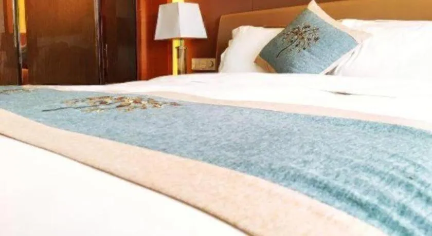 Bed in Howard Johnson by Wyndham Sunshine Plaza Ningbo