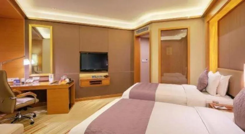 Bed in Howard Johnson by Wyndham Sunshine Plaza Ningbo