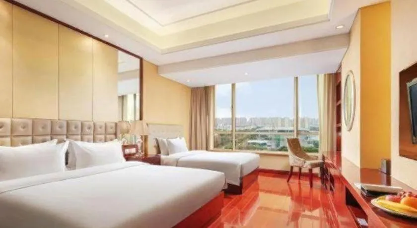 Bed in Howard Johnson by Wyndham Sunshine Plaza Ningbo