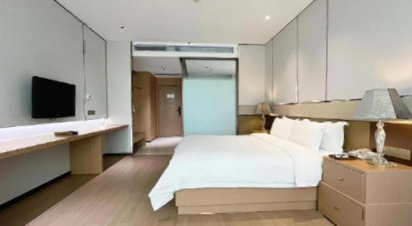 Bed in Howard Johnson by Wyndham Sunshine Plaza Ningbo