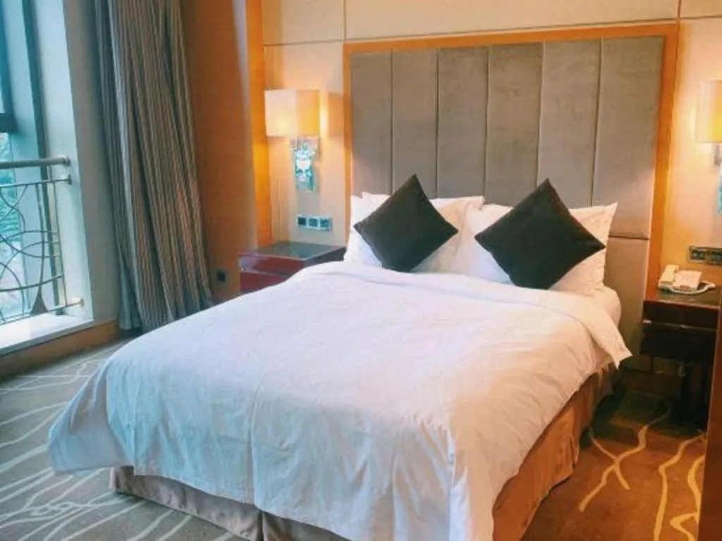 Bed in Gardenview Hotel