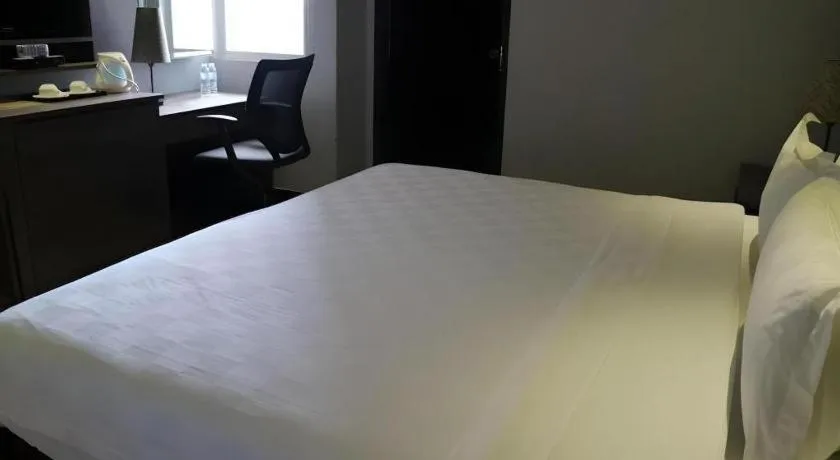 Bed in Avenue Suites