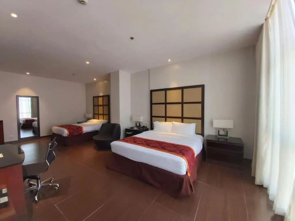 Bed in Avenue Suites