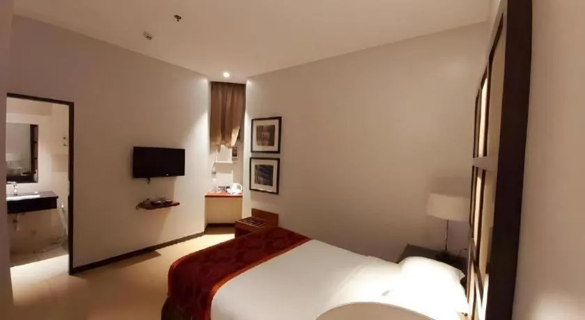 Bed in Avenue Suites