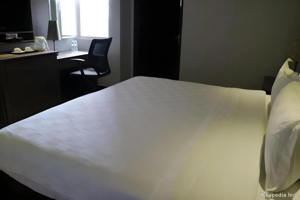 Bed in Avenue Suites