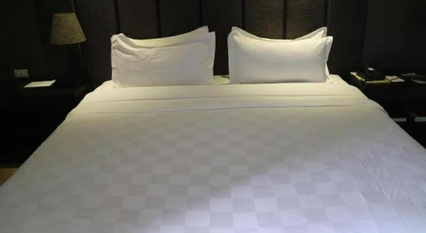 Bed in Avenue Suites