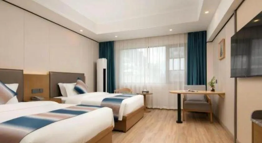 Bed in Zhangjiajie Fulante News Business Hotel