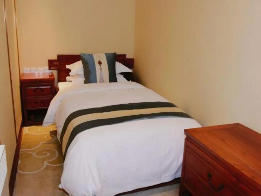 Bed in Huangshan Yupinglou Hotel