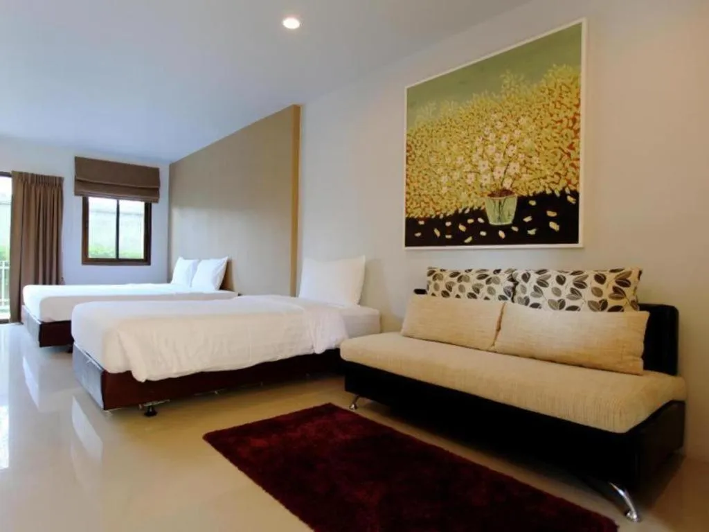 Bed in The One Residence Hotel