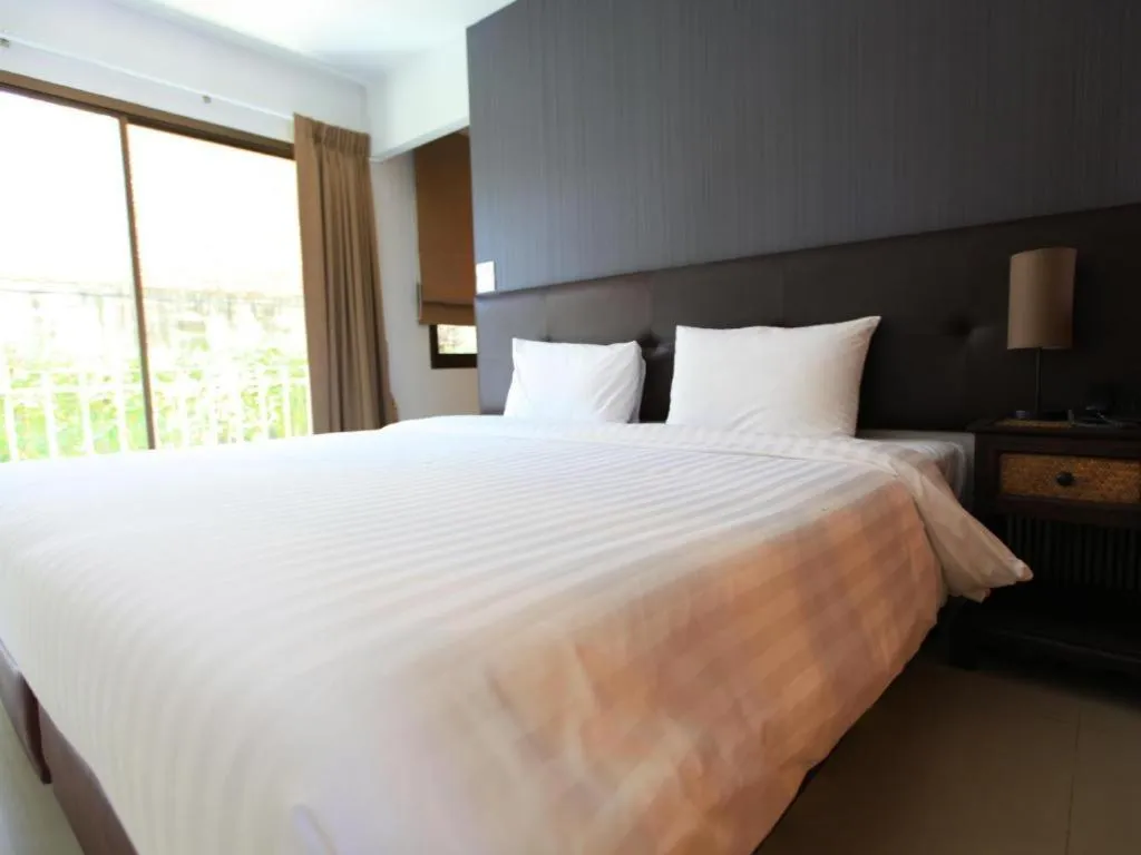 Bed in The One Residence Hotel