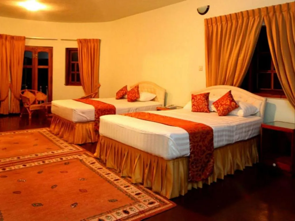 Bed in The Hideaway Hotel