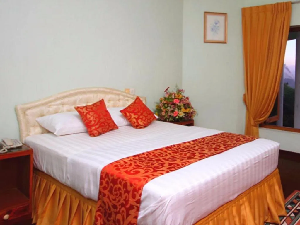 Bed in The Hideaway Hotel