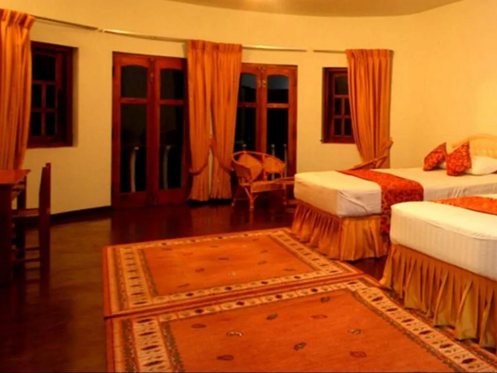 Bed in The Hideaway Hotel