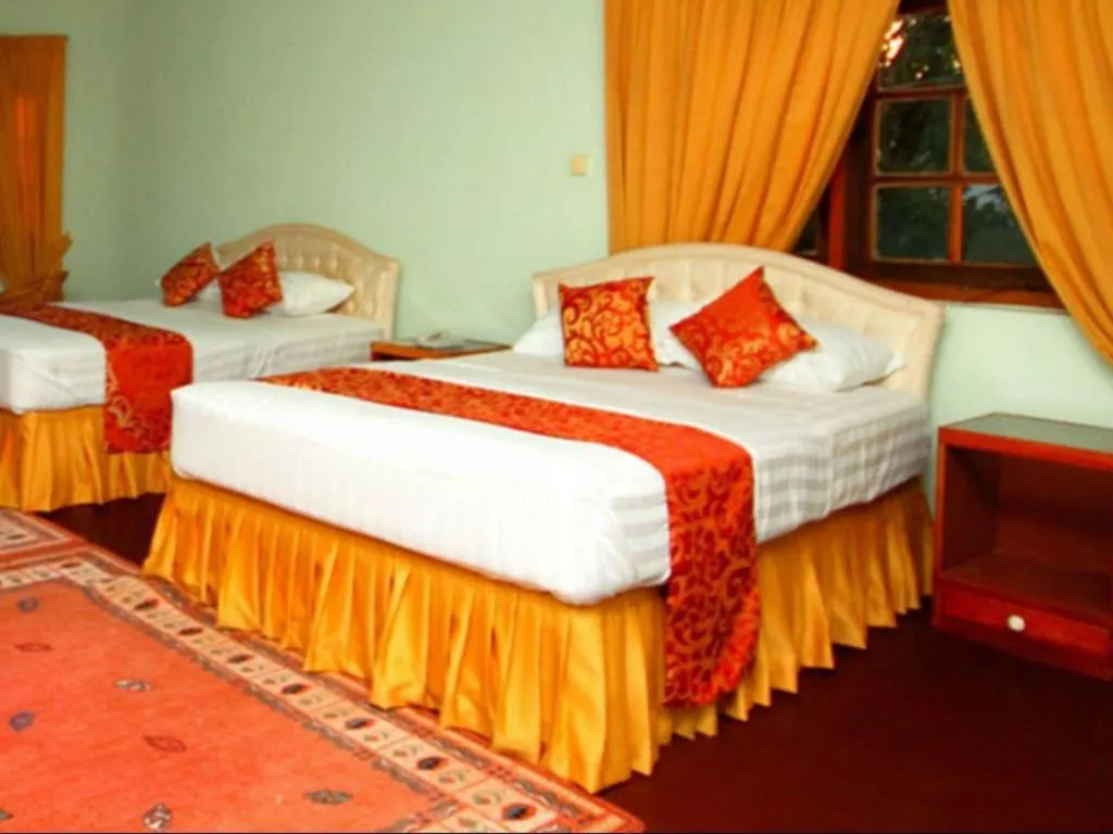 Bed in The Hideaway Hotel