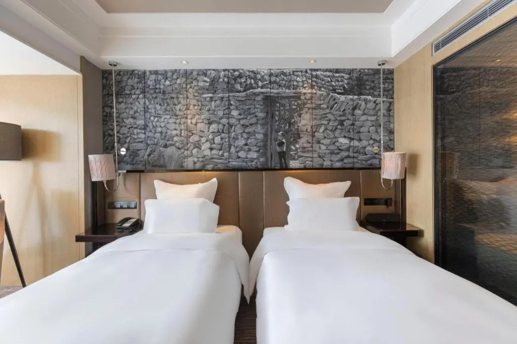 Bed in U Hotel Urumqi