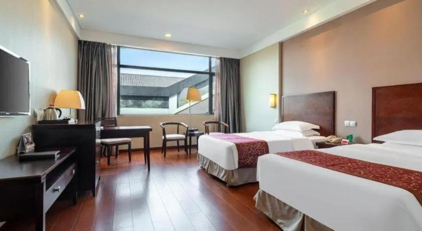 Bed in Ramada by Wyndham Suzhou Luzhi