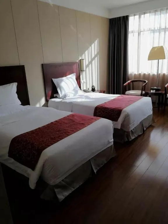 Bed in Ramada by Wyndham Suzhou Luzhi
