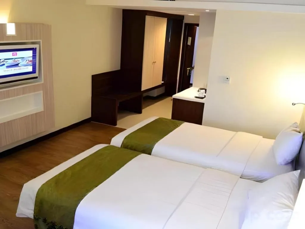 Bed in M - Regency Hotel