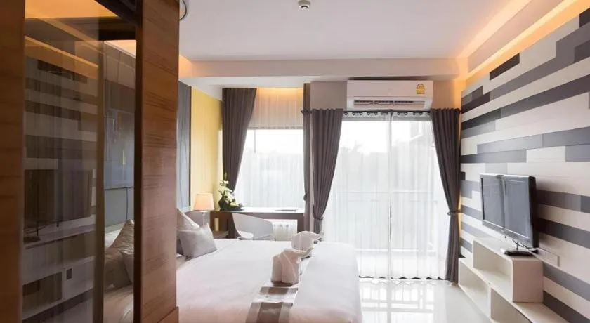 Bed in Vulcano Hotel at Nimman