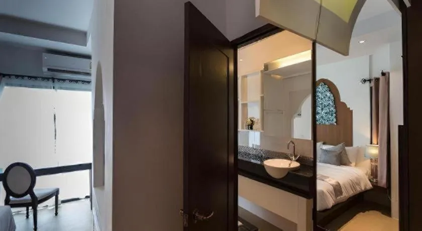 Bed in Vulcano Hotel at Nimman