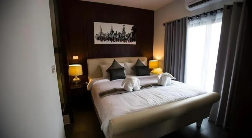 Bed in Vulcano Hotel at Nimman