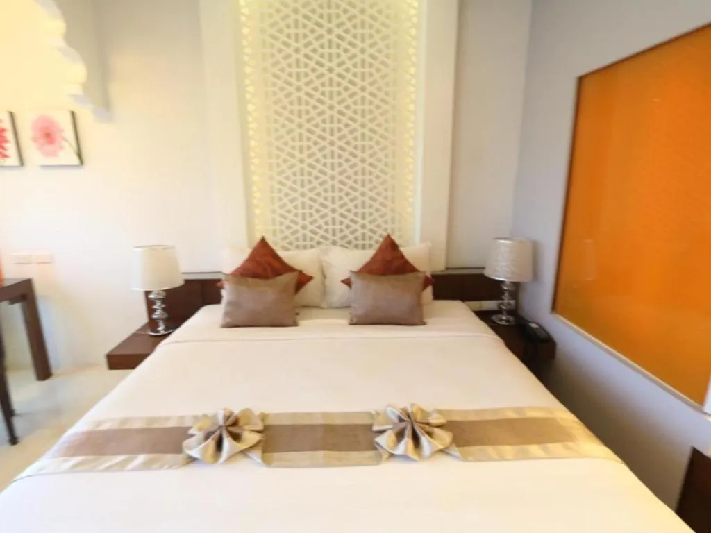 Bed in Vulcano Hotel at Nimman