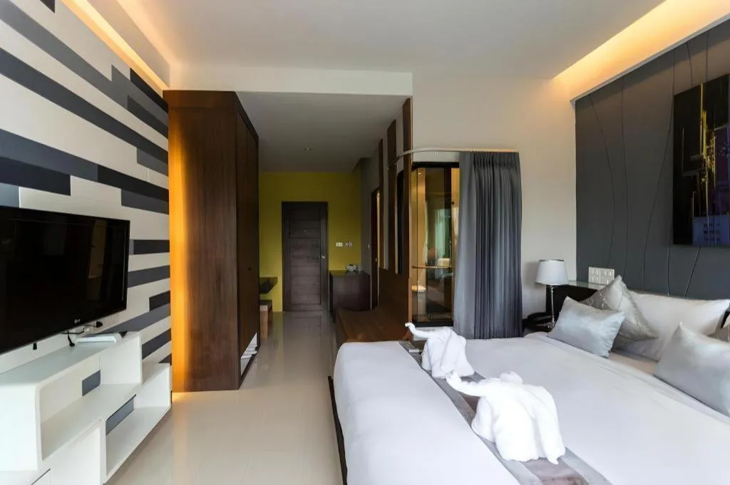 Bed in Vulcano Hotel at Nimman