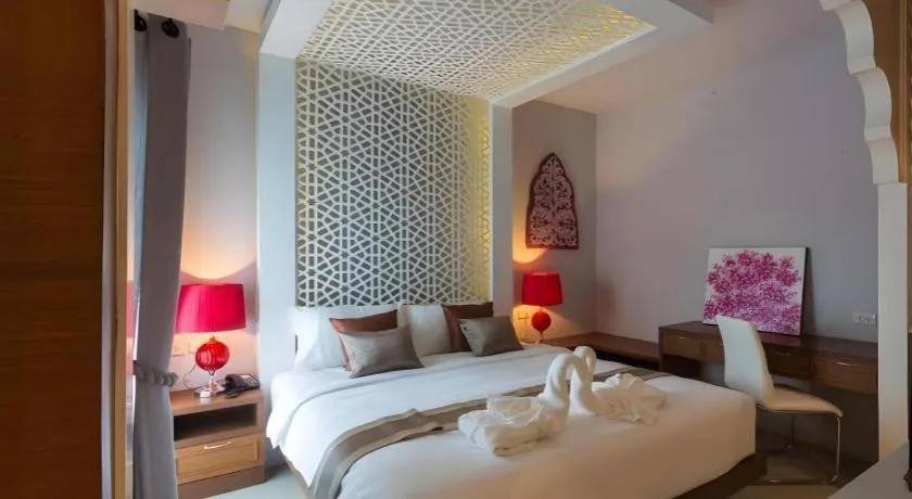 Bed in Vulcano Hotel at Nimman