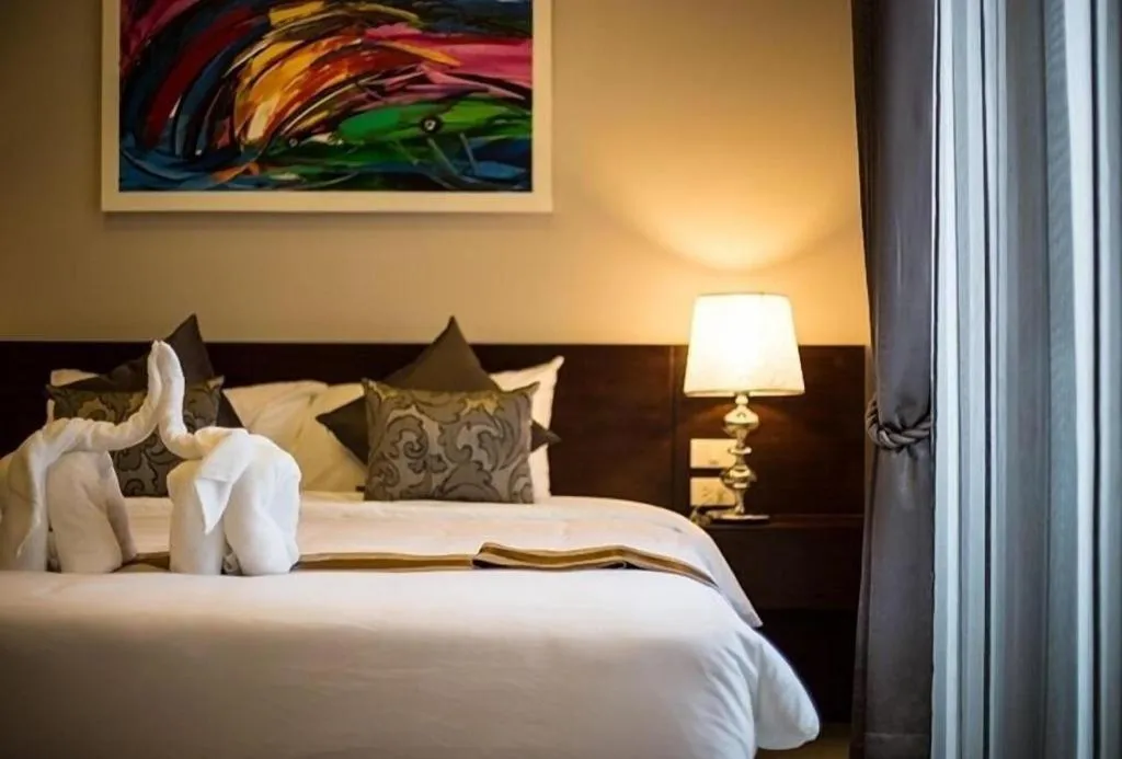 Bed in Vulcano Hotel at Nimman