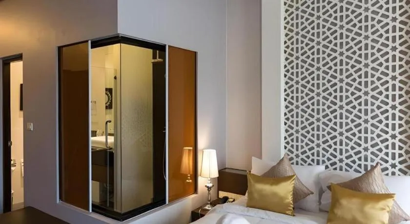 Bed in Vulcano Hotel at Nimman