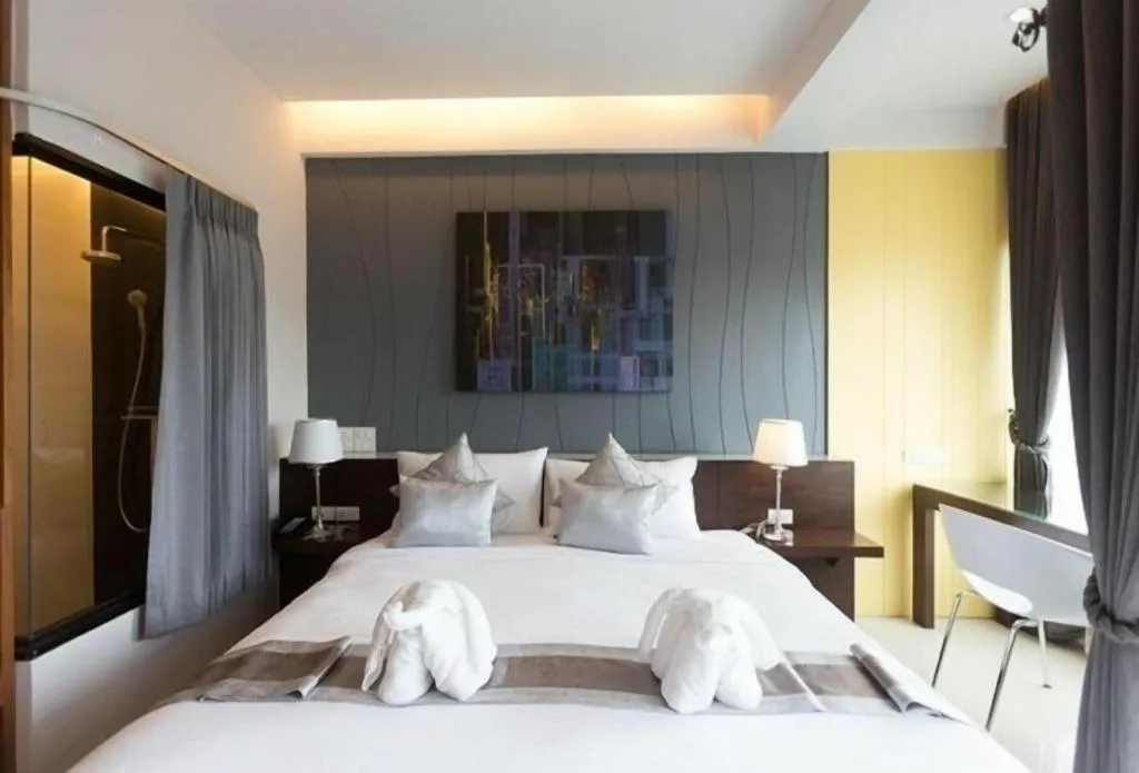 Bed in Vulcano Hotel at Nimman