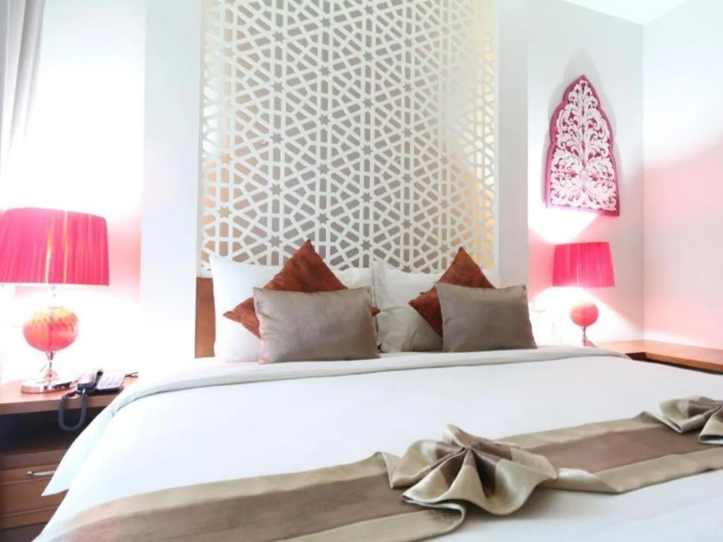 Bed in Vulcano Hotel at Nimman