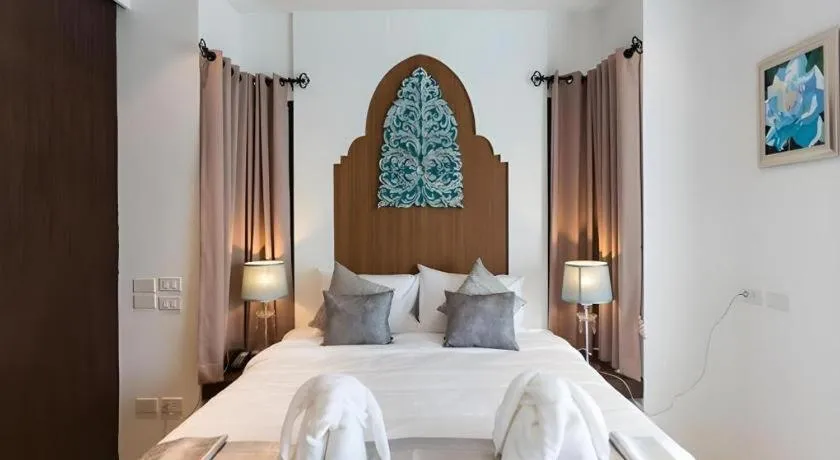 Bed in Vulcano Hotel at Nimman