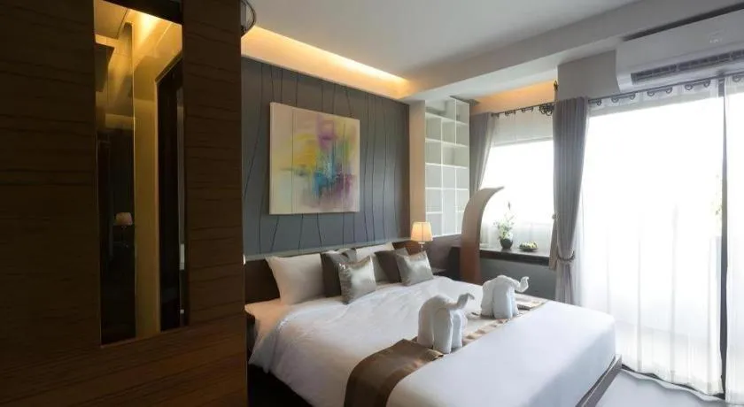 Bed in Vulcano Hotel at Nimman