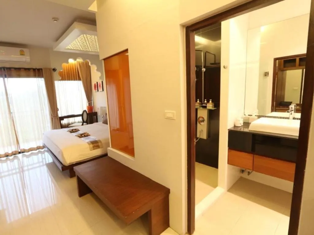 Bed in Vulcano Hotel at Nimman