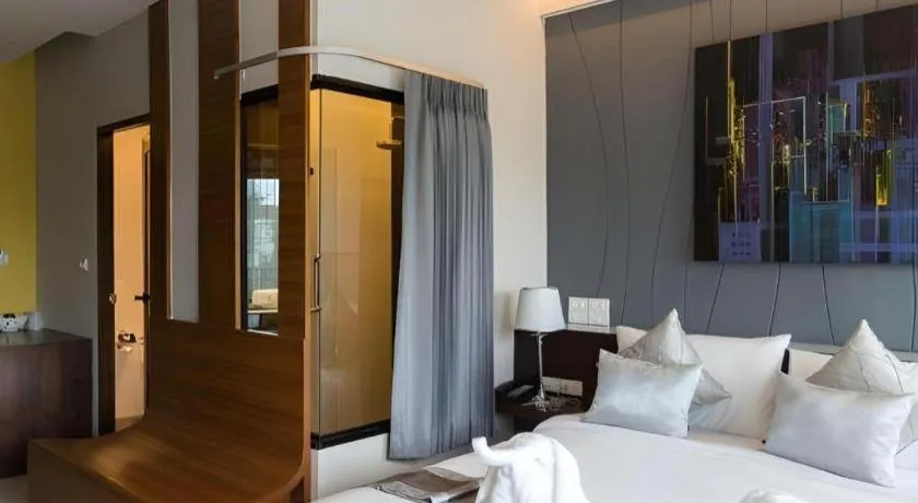 Bed in Vulcano Hotel at Nimman