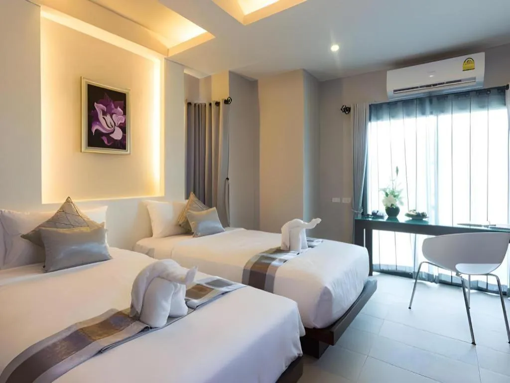 Bed in Vulcano Hotel at Nimman