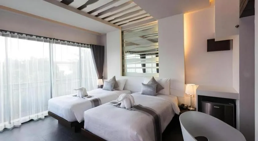 Bed in Vulcano Hotel at Nimman