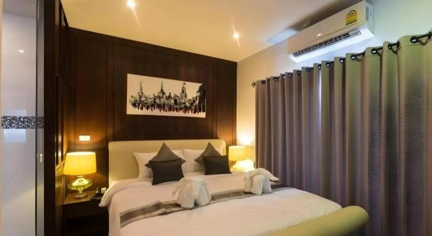 Bed in Vulcano Hotel at Nimman