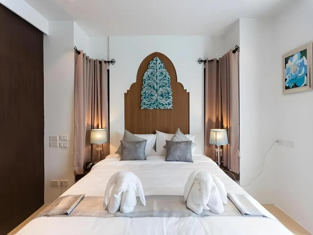 Bed in Vulcano Hotel at Nimman