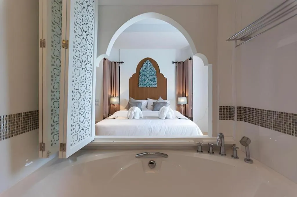 Bed in Vulcano Hotel at Nimman