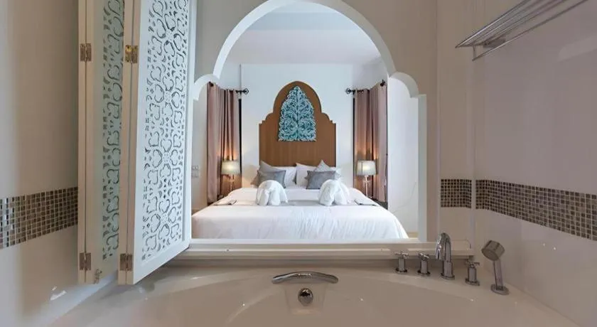 Bed in Vulcano Hotel at Nimman