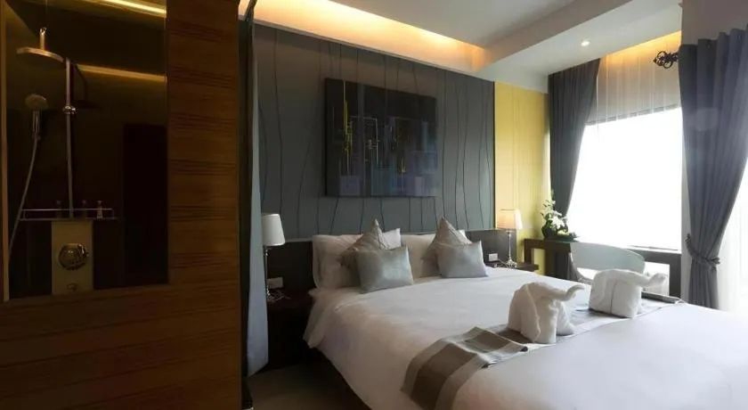 Bed in Vulcano Hotel at Nimman