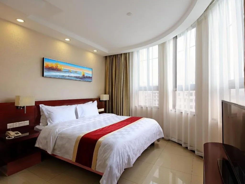 Bed in Nanfang Dasha Hotel