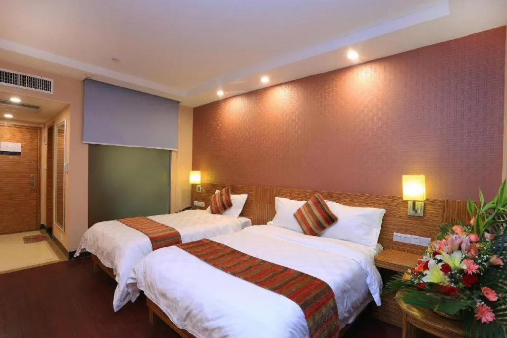 Bed in Nanfang Dasha Hotel