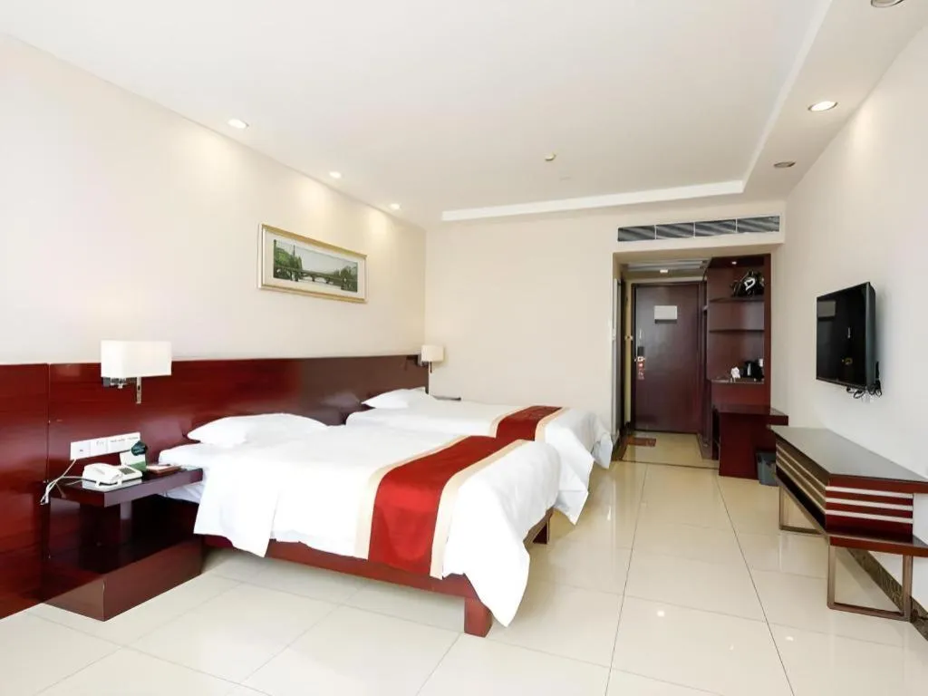 Bed in Nanfang Dasha Hotel