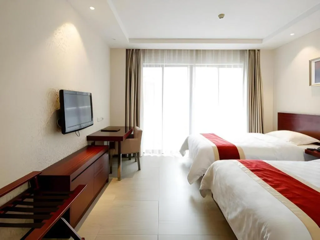 Bed in Nanfang Dasha Hotel