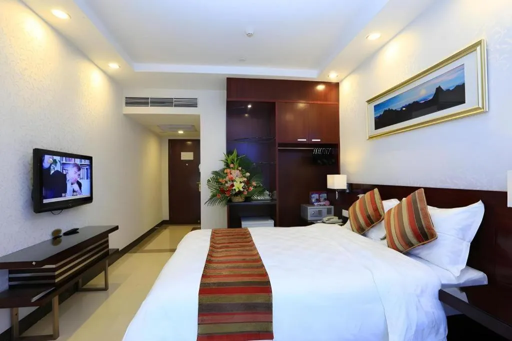 Bed in Nanfang Dasha Hotel